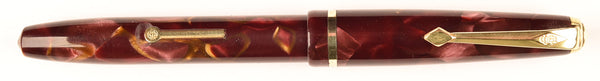 Conway Stewart 560 Dinkie in gold veined red pearl marble, Gold trim - Medium nib - Boxed