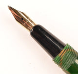 Conway Stewart 560 Dinkie in brown/gold veined green pearl marble, Gold trim - Medium nib - Boxed