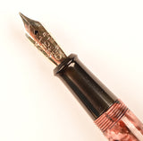 De La Rue Onoto lever pen in black veined rose pearl marble, Gold trim - Medium nib